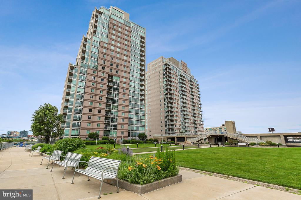 Welcome to Waterfront Square, a resort like condo community located right on the Delaware River!  Waterfront Square has arguably some of the best amenities in the city, from: valet parking, a giant sun deck right on the river, an indoor/outdoor pool with hot tub, a fitness center that rivals some of the private clubs in the city, 24/7 security, and a shuttle service that runs through Center City.  This 1 bedroom 1 bath unit in the Peninsula building has beautiful hardwood flooring, and open concept floor plan, a modern/spacious kitchen, views of the Delaware River, an in-unit washer & dryer, a large bedroom with great closet space, and tons of natural light.  Waterfront Square has an awesome location with full access to the waterfront, Northern Liberties, & public transportation.  It's also conveniently located near the Ben Franklin bridge and major roadways making all commutes that much easier.  The combination of 1-car parking plus the Waterfront Square shuttle makes all travel needs extremely efficient.  Don't let this opportunity pass you by.