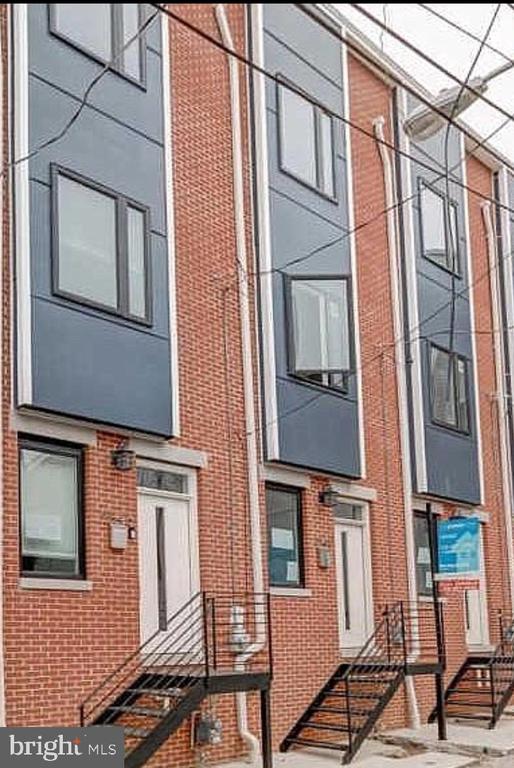 This three story beautiful home in Fishtown is available for Rent! It has plenty of living space and stylish finishes. This 3 bedroom, 3 bathroom home defines luxury with 3rd floor master suite including access to huge roof deck with incredible views! This home includes hardwood floors throughout and full finished basement featuring third bedroom & full bath. First floor stuns with an open floor plan consisting of living room, dining room, eat in kitchen with breakfast bar and access to rear yard.  Head upstairs to the 2nd floor with one-bedroom, full hallway bathroom and conveniently located laundry area. Third floor houses the master suite with large master bathroom and large closet. From the master suite, access the large roof deck perfect for entertaining! Home is in a great location on a small quaint street. Close to public transportation and not far from Center City! Schedule your showing today!