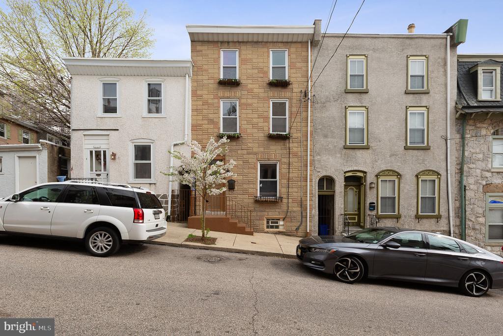 Welcome to Roxborough! Close proximity to Manayunk, Chestnut Hill, Fairmount Park, Center City, Conshohocken, and King of Prussia. Walking distance to Main Street in Manayunk, Ridge Avenue Business District in Roxborough, Pretzel Park, and the Wissahickon Train Station; as well as many convenient bus routes along Ridge Ave. Everything has been taken care of in this impeccably rehabbed, classic, Philadelphia row home, which comes with 3 bedrooms and a den/office, modern kitchen, modern full bathroom + modern half bathroom, hardwood floors, washer/dryer, and a private rear yard with shed. The amazing kitchen features granite countertops, stainless steel appliances, mosaic tile backsplash, and a galley layout. The open floor plan allows for easy living/entertaining inside, and the side breezeway allows for easy living/entertaining outside. You can choose to walk, bike, use public transit, or drive on a daily basis. This ideal location also allows you to run + bike right into the lush green trails of the Wissahickon Valley, just minutes from your front door. 183 Markle St provides a charming, historic Main Street lifestyle, with convenient access to Philadelphia's great restaurants, shops, and recreation!