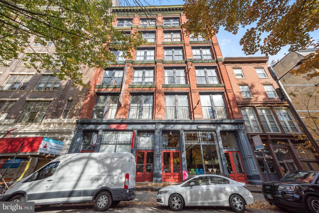 Experience lovely Old City living in the classically modern Hoopskirt Factory condominiums on historically significant Arch St. This unique bi-level condo features an open living room area and all the quintessential architectural elements that define a loft including vintage hardwood flooring, wood beams, high ceilings, large windows and exposed brick. Upon entering, you will be impressed by the soaring ceiling height and dramatic staircase. The ergonomically balanced kitchen has everything the experienced, at home chef needs including stainless steel appliances, plenty of counters and cabinets for storage and, most importantly, expanded pantry space. The bedroom has everything you need for a cozy night inside during the winter months or a breezy quiet evening in the warm seasons. Just like many aspects of Old City, Hoopskirt Factory has a legacy. Initially a historic warehouse, it was only recently converted into condominiums. The convenient location is a quick drive to most major highways, close to public transportation, and surrounded by plenty of parking options. And last by not least, Old City has plenty of dining, shopping, galleries, history, and night life. The Hoopskirt Factory condos are only a few blocks from exciting spots such as Indy Hall, Amada, Chloe, and Franklin Fountain. If you're looking to experience Philly's history, charm, and overall style, this is the place to be. Condo fees cover: Master insurance, Water/sewer, common area/exterior maintenance, management, trash and snow removal. BONUS-Your tax abatement extends through December 31,2025.
