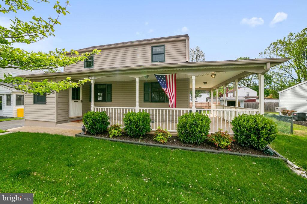 Welcome to this charming colonial style home located in the heart of Oreland in Springfield Township, near the train station, local shopping and expressway/turnpike. This home has a wrap-around, covered front porch, perfect for lounging and entertaining. Enter through the tiled foyer/ mudroom, into the spacious living room, which features beautiful hardwood floors, rustic wooden beams and original wood molding. Continue through the open floor plan towards the kitchen, which also includes rustic wooden beams, with matching rustic cabinets and built-in shelves, as well as plenty of natural light. Upstairs you will find three bedrooms and a full bath, with hardwood floors throughout. The detached garage includes additional storage space. Enjoy time outside, with a spacious fenced-in backyard. Don't miss your opportunity to live in a conveniently located township and wonderful school district! Schedule a showing today!