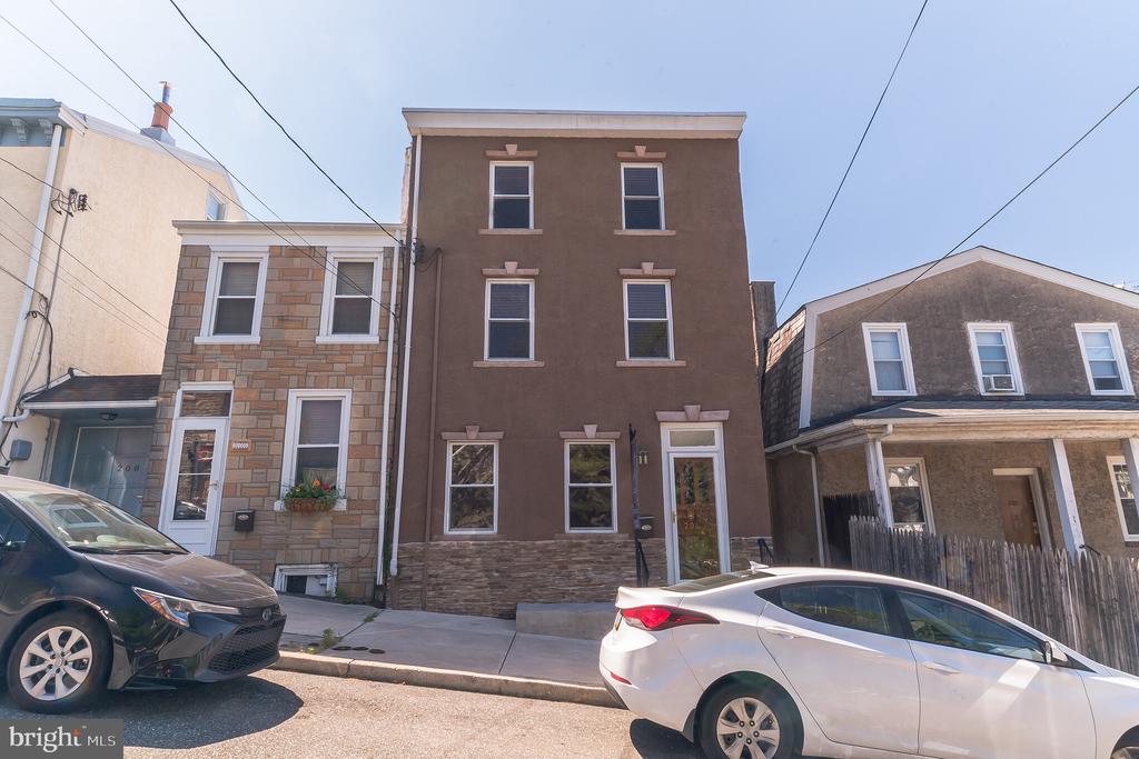 Welcome to one of Philadelphia's hottest neighborhoods, Roxborough/Manayunk! This recently rehabbed townhome is located on a quiet street, yet is just minutes away from some of the best amenities, including: Main Street shopping + dining, Ridge Ave business district, Pretzel Park, Wissahickon Train Station, & many convenient public transportation routes. With 3 levels, this spacious home features 4 bedrooms, 2 full baths, 1 bonus room, and a fenced-in backyard with EverLawn installed (no maintenance!). The main floor includes a living room with ample natural lighting, formal dining room & gourmet eat-in kitchen, with granite countertops, tile backsplash, recessed lighting & stainless-steel appliances. The interior features include newer hardwood floors, HVAC system, windows, electrical wiring & sidewalks! You can choose to walk, bike, use public transit, or drive, with close proximity to Chestnut Hill, Fairmount Park, Wissahickon Park, Center City, Conshohocken, and King of Prussia. This home combines a charming, historic Main Street lifestyle, with convenient access to Philadelphia's great restaurants, shops, and recreation! Schedule a showing today!