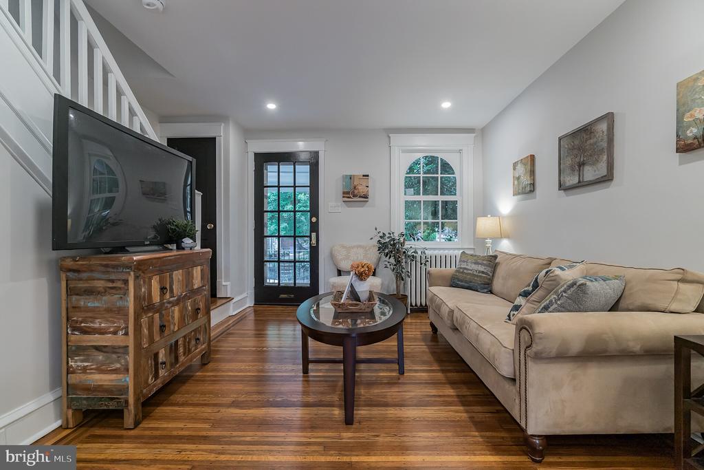 Welcome to 3448 Tilden St in East Falls! Centrally located near Center City, Manayunk, Chestnut Hill, Conshohocken, and King of Prussia. Walking distance to Kelly Drive, Fairmount Park, Downtown East Falls, and just blocks from the East Falls Regional Rail station and multiple bus routes. Everything has been taken care of in this 2-story, straight-through, classic Philadelphia red-brick rowhome, which comes with the following: open concept living + kitchen area; modern kitchen w/ side dining area; modern full bathroom on 2nd floor; 2 large bedrooms; original + restored pantry storage w/ counter seating; fantastic front porch; and a spacious private/fenced-in rear yard. The incredible kitchen features quartz countertops, stainless steel appliances, and subway tile backsplash. The modern floor plan has hardwood floors + great natural light, as well as easy living/entertaining options, where you can enjoy Philadelphia's four traditional seasons on the front porch or in the rear yard. This ideal + convenient location also allows you to walk, run, and bike on Kelly Drive, or directly into the lush green trails of the Wissahickon Valley, just minutes from your front door. 3448 Tilden St provides a charming, historic, urban lifestyle, with convenient access to Philadelphia's great restaurants, shops, and recreation!