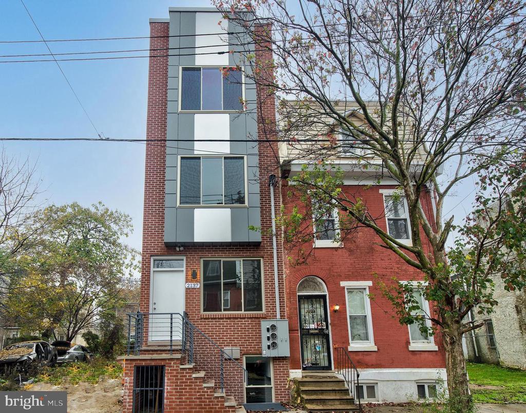 Amazing INVESTMENT OPPORTUNITY in booming 19122! Take advantage of a hot rental market today! New Construction Duplex with a 10 YEAR TAX ABATEMENT to keep your operating cost low! Purchase the building and rent out both 3 bed and 3 full bath units or move in to one and rent the other. Tastefully completed by a well respected builder, this building features high end cabinetry , quartz countertops and real hardwoods! Unit 1 showcases a smartly laid out floorplan with the first bed and bath on the main floor just down the hallway from the modern kitchen. The living room looks out into the private rear patio. The lower level is bookended by large bedrooms and two full bathrooms allowing for great privacy between roommates. Unit 2 is a sight to behold with a grand first floor kitchen and living room leading to an expansive front bedroom and full bath. Heading upstairs again allows for maximum privacy for your tenants with a long hallway separating the bedrooms, each with their own en suite bathrooms. For more outdoor space head upstairs to the private roofdeck! Tax numbers are estimates.