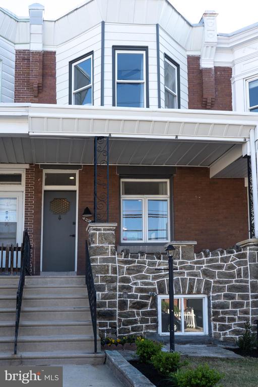 Welcome to Roxborough, and to 4221 Terrace Street! Close proximity to Manayunk, Chestnut Hill, Fairmount Park, Center City, Conshohocken, and King of Prussia. Walking distance to Gorgas Park, Main Street in Manayunk, Ridge Avenue Business District in Roxborough, and the Wissahickon Train Station; as well as many convenient bus routes along Ridge Ave. This wonderfully updated, 2-story, red brick, Philadelphia straight-through row home, comes with the following: Living room connected to a modern/open kitchen; open front porch; dining area; modern full bathroom on 2nd floor; 3 bedrooms; awesome fenced-in rear yard. The amazing kitchen features quartz countertops, eat at peninsula, stainless steel appliances, tile backsplash, and an open/light-filled workspace. The modern floor plan has hardwood floors + great natural light, as well as easy living/entertaining options, where you can enjoy Philadelphia's four traditional seasons in the rear yard or on your front porch. You can choose to walk, bike, use public transit, or drive on a daily basis. This ideal + convenient location also allows you to walk, run, and bike on the Manayunk Tow Path, or directly into the lush green trails of the Wissahickon Valley, just minutes from your front door. 4221 Terrace Street provides a charming, historic Main Street lifestyle, with convenient access to Philadelphia's great restaurants, shops, and recreation!