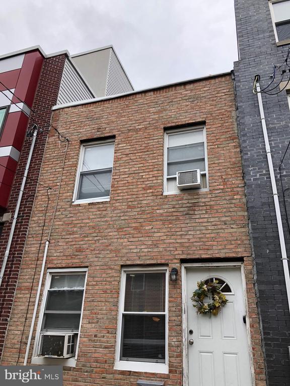 INVESTORS AND DEVELOPER SPECIAL! Come check out this home ripe for a renovation on a great block in Point Breeze. The block is loaded with current new construction and renovation builds at the moment! This home is sandwiched between two new 3-story single family homes which will allow the buyer to build up and another floor here drastically increasing the bed, bath and square footage count! This home is being sold "As-Is" and is currently occupied. Property will be delivered vacant, tenant is moving out at the end of April.  Walk the block and tour the home and give us your best offer!