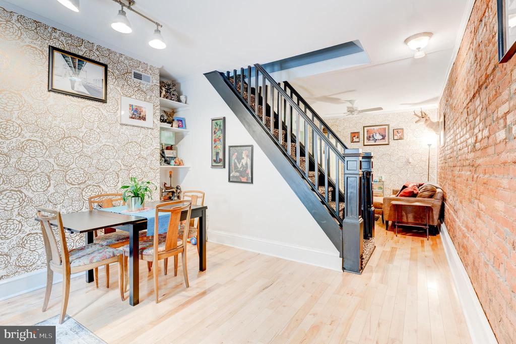 Do not miss out on this Northern Liberties gem!! A spacious and unique oasis located on a beautiful tree-lined street! Adjacent to Liberty Lands park and a few steps away from all of the shops and restaurants on N 2nd Street this home has it all. Enter in the front door and admire the spacious first level accented with exposed brick running all the way back towards the vintage-style gorgeous kitchen! Heading up the leopard print stairs will take you to the first full bath with access to the extra large back deck outdoor area.  A perfect spot to unwind after work on these late Summer days!  This second floor also features a large first bedroom perfect as a guest room, office or nursery. Heading to the third floor, the gorgeous owner's bedroom and second bedroom with loft area are on display with tons of natural light pouring in! Plenty of extra room here for storage between the loft and the basement. Schedule your tour today, this home will not last long!