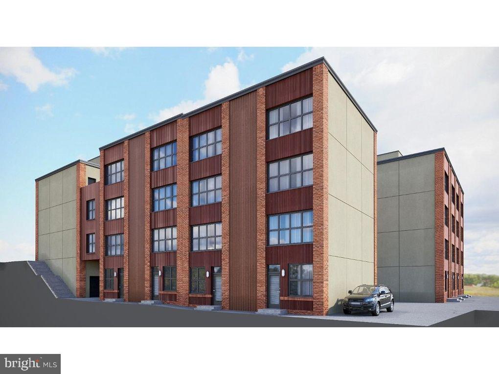 Cobblestone Court is Manayunk's newest luxury townhome community. Upon entering through the front door, you are ushered into a large open concept main floor with Living, Dining and Kitchen. The spacious kitchen with stainless steel appliances with a large island. Second and third floor have two oversized bedrooms with common hall bath and large laundry room. There is also an additional spacious private roof deck! This unit comes with a oversized 1 car garage leading into the home's bonus room. This new project is located on one of the best areas in Manayunk, just a few short blocks to all the best dining, shopping + entertainment on Main Street, as well as the Manayunk train station. Photos of similar building.