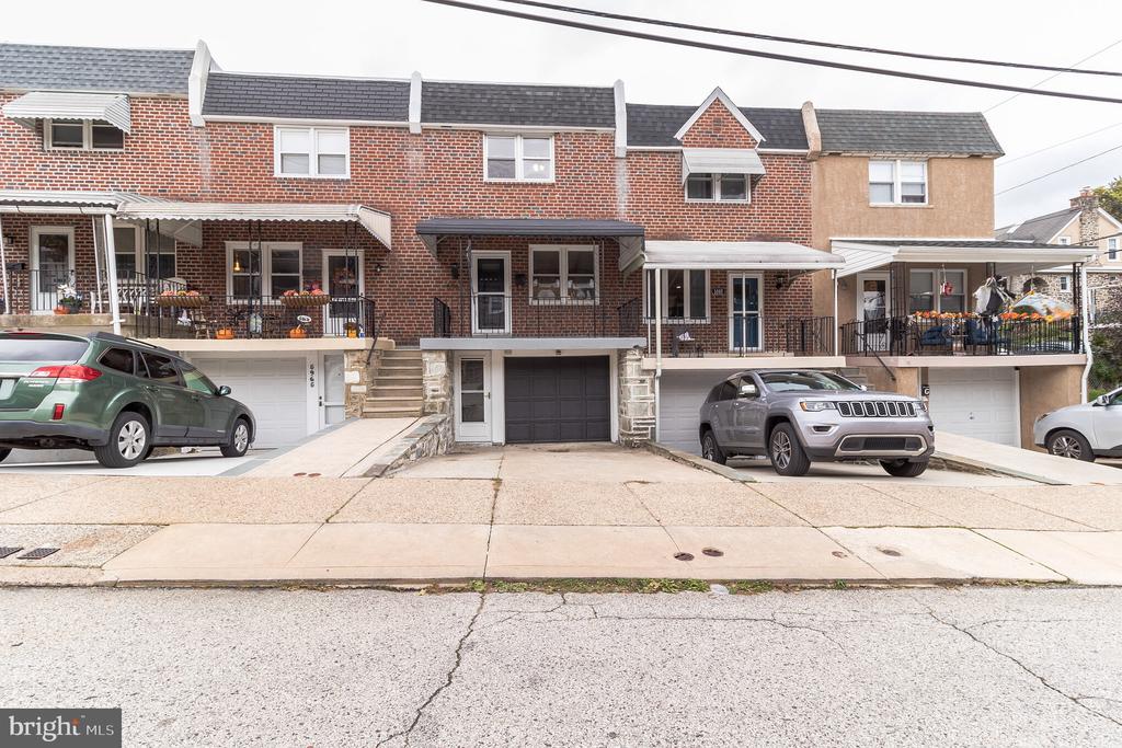 Welcome to Roxborough, and to 5967 Jannette Street! Close proximity to Manayunk, Chestnut Hill, Fairmount Park, Center City, Conshohocken, and King of Prussia. Walking distance to Gorgas Park, Main Street in Manayunk, Ridge Avenue Business District in Roxborough, and the Manayunk Train Station; as well as many convenient bus routes along Ridge Ave. Everything has been taken care of in this fantastic, 2-story, Philadelphia airlite, twin home, which comes with the following: living room connected to the dining area; modern/open kitchen; modern full bathroom and half bathroom on 2nd floor; modern half bathroom in the finished basement; 3 spacious bedrooms; garage and driveway parking; and awesome front porch and fenced-in rear yard. The amazing kitchen features quartz countertops, large island, stainless steel appliances, tile backsplash, forest green cabinets w/ brass hardware, and an open/light-filled workspace. The basement area is fully finished, perfect for a theater room, WFH office, and/or home gym. The modern floor plan has hardwood floors + great natural light, as well as easy living/entertaining options, where you can enjoy Philadelphia's four traditional seasons in the rear yard or on the front porch. You can choose to walk, bike, use public transit, or drive on a daily basis. This ideal + convenient location also allows you to walk, run, and bike on the Manayunk Tow Path, or directly into the lush green trails of the Wissahickon Valley, just minutes from your front door. 5967 Jannette Street provides a charming, historic Main Street lifestyle, with convenient access to Philadelphia's great restaurants, shops, and recreation!