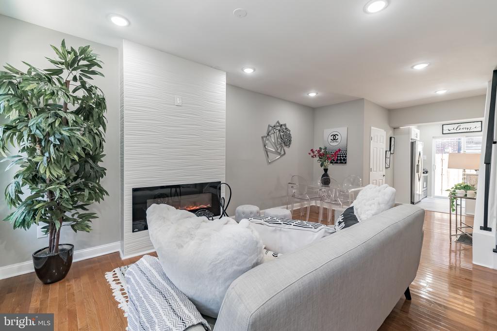 Welcome to 1709 S Dorrance Street, a newly  renovated 2 bed, 1-1/2 bath home in Point Breeze located on great neighborhood friendly street.   This area is booming with newly renovated homes and lots of new and exciting development.   The first floor is open concept with  hardwood floors and tile kitchen floors.    The living room has an electric fireplace with tile surround and the large windows in the front of the house bring in lots of natural light throughout the day.    There is also  a 1/2 bath on the first floor.   The kitchen has white shaker cabinets, quartz counter tops, stainless steel appliances, tile floor with white hexagon careera backsplash.   Off of the kitchen through the sliding doors is a private outdoor patio.    Head upstairs where you will find two spacious bedrooms and a large bathroom with a stand up shower, double vanity sink and a large bluetooth defogging mirror.
Anchored by edgy coffee shops and local bars, this up-and-coming, culturally diverse neighborhood draws a laid-back crowd of locals. Casual Vietnamese and Mexican eateries sit side by side with chef-owned gastropubs serving craft beer. In warm weather, the area comes alive with a festive pop-up beer garden and outdoor jazz concerts on Ellsworth Street, down the road from Keith Haring’s mural “We Are the Youth.”  Schedule your showing today.