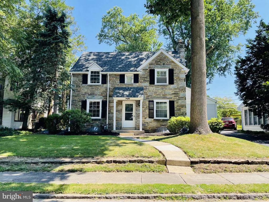 It’s not too late to pack  up and move  before new school year starts in this home totally renovated from basement to attic and roof, new open layout and expand living space make it meet most needs for modern life style.  While it maintains 3 bedrooms on 2nd floor, another room is added on the first floor to be used for 4th bedroom or office space, enclosed porch is another option to be used as mud room or office space as needed. Finished large attic area is an extension from master bedroom for extra space to be used as you can imagine.  
Large kitchen is featured with long/wide island and 36”  range/extra-capacity hood, 36” sink , many cabinets for storage , and a sliding door to the fenced quiet backyard. It is reinsulated on affected walls and attics, replaced with new windows, installed with high-efficiency gas-driven water heater and HVAC system, energy saving and pain free like a new construction built with stone.
