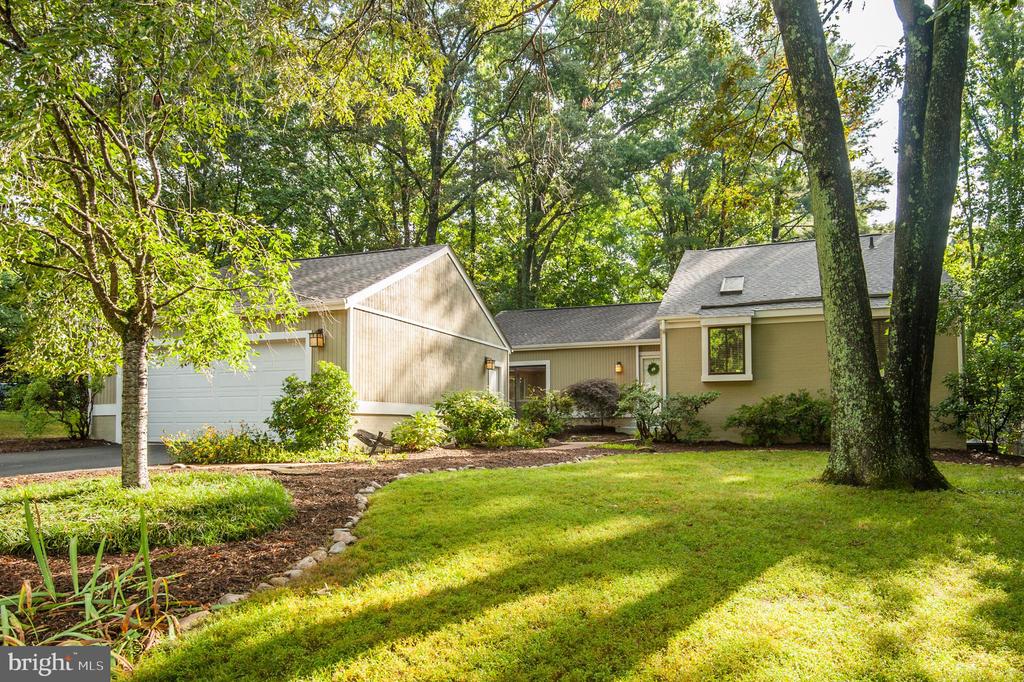PHENOMENAL HOME! In sought after Fox Mill Woods is just what you have been waiting for! 2 fully finished levels (walk out lower level) offering over 3000 square feet of living space! There is plenty of space to live and work in this great new listing.  Roof , HVAC and water heater are 2-3 years young.  Gourmet kitchen updated tastefully with island, gorgeous cabinets, cool lighting, stainless steel appliances and granite countertops. Gas cooking and heat! 2 fireplaces! All baths have been beautifully upgraded as well.  The Master bedroom and bath are a lovely spa like sanctuary. The other 2 bedrooms on the main level are generously sized and super cute. Most of the home has been freshly painted in designer colors. The lower level almost doubles the living area! Its walk out so it has loads of natural light and offers a rec room, wet bar, mud room, media room, bedroom and full bath!  You will love the outdoor life on two huge decks that are nestled among trees and natural settings and perfect for entertaining! Convenient location close to metro and shopping, toll road and schools.  NO HOA! (yes you can cut down a tree  or change your door color without the HOA police on your tail!)  This home will NOT disappoint! OPEN  Sat Aug 6: 12-2:30 SUNDAY OPEN CANCELLED - HOME UNDER CONTRACT