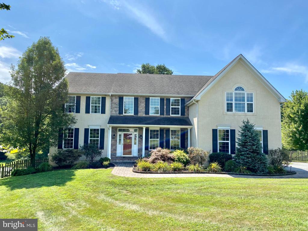 More pictures to come! Professional photos on Wednesday. Welcome to the Taylor's Run, the newer section of the Red Bridge Farm community! This conveniently located, 10 year young, Colonial Home located in one of the top ranked school districts, Unionville ChaddsFord SD, Plus the sought after Pocopson Elementary.  Situated in a quiet cul-de-sac setting, this stunning home overlooks a Pond & Protected Woods with views of Rolling Hillsides! Enjoy all this from a lovely Sun Room/Florida Rm with a Vaulted Ceiling,  or take your Outdoor Entertaining to a whole new level with your large Trek-like Deck, Paver Patio & Outdoor Kitchen, complete with grill, mini refrigerator and Pergola! Listen to the bubbling Waterfall Feature & songs of many species of birds & fowl. The Fire pit offers cozy times to enjoy many months outside. The open concept floor plan offers terrific flow, an abundance of light, rough-honed Hardwood Floors, a Gourmet Kitchen including Granite Counters, Stainless Steal appliances, Under Cabinet Recessed & Pendant lighting, & handsome Island which opens to the Breakfast room, Florida rm, Dining Rm(with a built-in custom Hutch) & Great Room and opens to the 2nd story with huge windows & a Gas Fireplace. Off the Great room you will find an Office & a Library, both with 15 light doors & ceiling fans. Off the kitchen you'll find the Mudroom/Laundry, with a built-in bench & cabinets, (just the right size for storing your laundry baskets or book bags) a handy service door to the driveway & side yard plus access door to the Garage. A tiled Full bath with a stall shower, built in Vanity & Octagon window off the Mudroom/Laundry completes this well considered use of space.   The 2 staircases offer convenient access to the 2nd floor with a full spacious Master Suite including 2 walk in closets, dressing area,  Master Bath with soaking tub, 2 vanities and shower. 3 more bedrooms (all with Ceiling Fans) & another Full Bath with 2 sinks and a tub shower finish off the 2nd floor.  The Walkout Basement features a sliding door & egress window, high ceilings & well insulated walls. In just minutes you will find all kinds of shopping & Restaurants in near-by Kennett Sq., Uptown West Chester & nearby Centreville. Choose from Wegman's/Whole Foods/Trader Joe's + many more, plus local butchers & farmers markets. Longwood Gardens/Winterthur/Hagley Museum/Greenway Trails/Stroud's Preserve/Brandywine Creek Park all just mins away.