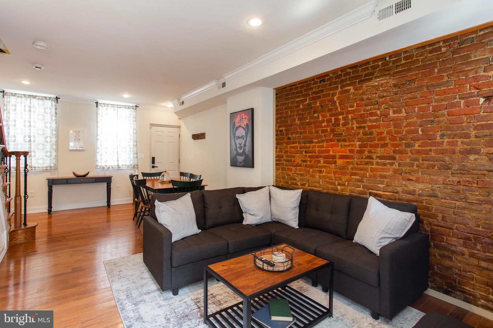 Discover a warm and inviting 3 bedroom, 2 bathroom home in the heart of Philadelphia's culturally rich Bella Vista neighborhood. This thoughtfully designed residence seamlessly blends modern comfort with classic charm.
Upon entering, you'll be greeted by a spacious and naturally lit living area that gracefully transitions into a dining space. The open-concept layout is adorned with gleaming hardwood floors, setting a welcoming tone for relaxation and entertaining.
The kitchen is a gourmet delight, boasting stainless steel appliances, granite countertops, and abundant cabinet space. Whether preparing a quick breakfast or hosting a memorable dinner party, this space has you covered. 
Step outside to your private deck, an outdoor oasis for gatherings, gardening, or simply unwinding in the fresh air. Little Saigon's vibrant atmosphere surrounds you, offering a variety of Vietnamese eateries, charming shops, and a welcoming community spirit.
Don't miss this opportunity to call Bella Vista your home. Schedule a showing today to experience the allure of this thriving community in Philadelphia.