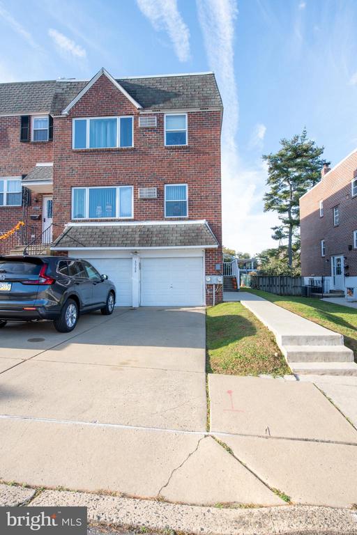 Welcome home!!! A solid brick twin duplex for sale near Holy Family University. Both floors have 2 bedrooms and 1 bathroom. The ground level has a spacious 2 car garage with plenty of room for storage. The property has been family owned and occupied since 2000. It has been very well kept. The first and second floor have newer carpet wall to wall, and there is plenty of outside space to be enjoyed.  The first floor tenant has a lease which expires in 9/30/2024, and the second floor will be delivered vacant the day of settlement.
