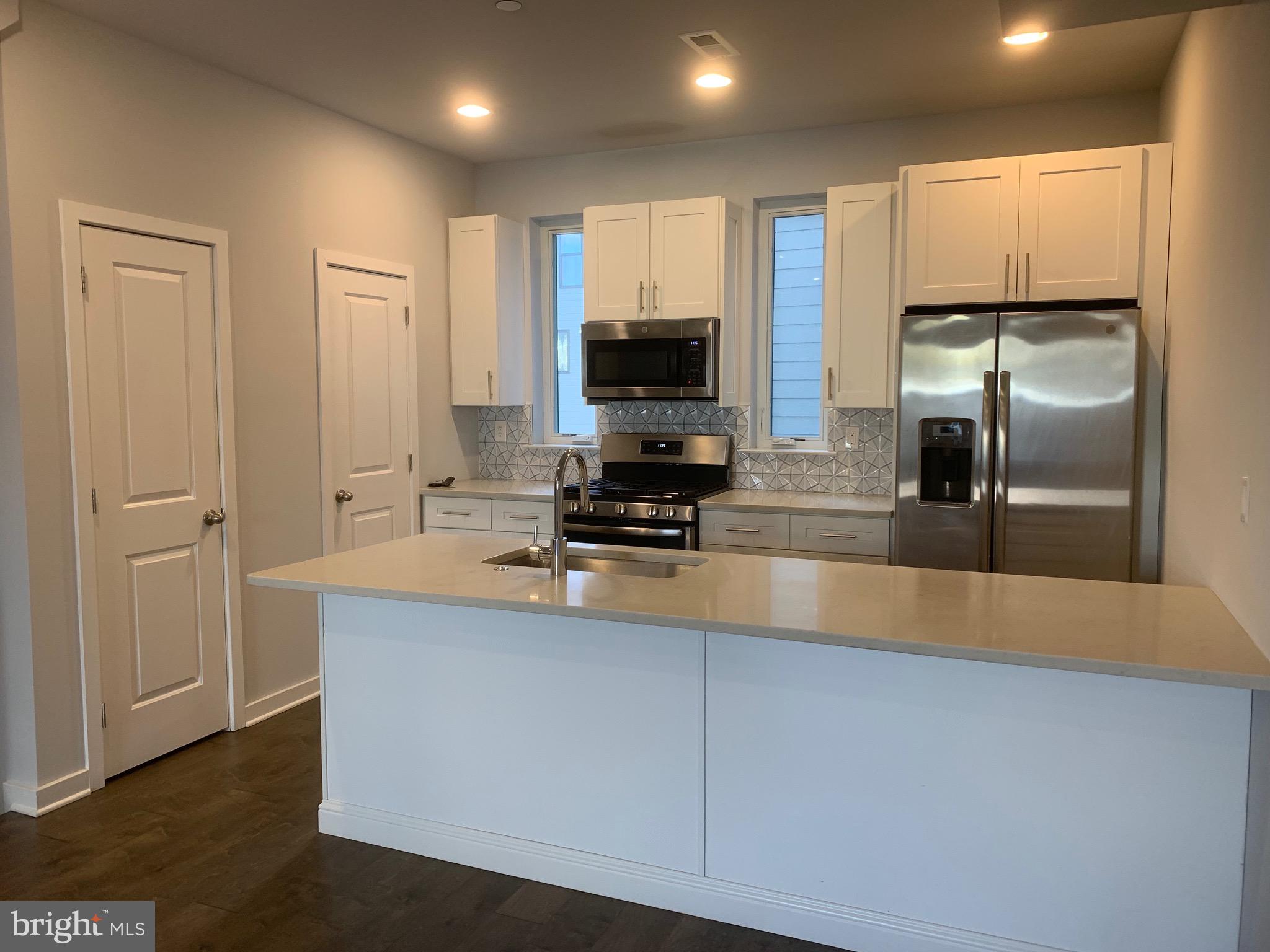 Cobblestone Court is Manayunk's newer luxury townhome community. Upon entering through the front door, you are ushered into a large open concept main floor with Living, Dining and Kitchen. The spacious kitchen with stainless steel appliances with a large island. Second and third floor have two oversized bedrooms with common hall bath and large laundry room. There is also an additional spacious private roof deck! This unit comes with an oversized 1 car garage leading into the home's bonus room. This new project is located on one of the best areas in Manayunk, just a few short blocks to all the best dining, shopping + entertainment on Main Street, as well as the Manayunk train station. Photos of Similar Unit.